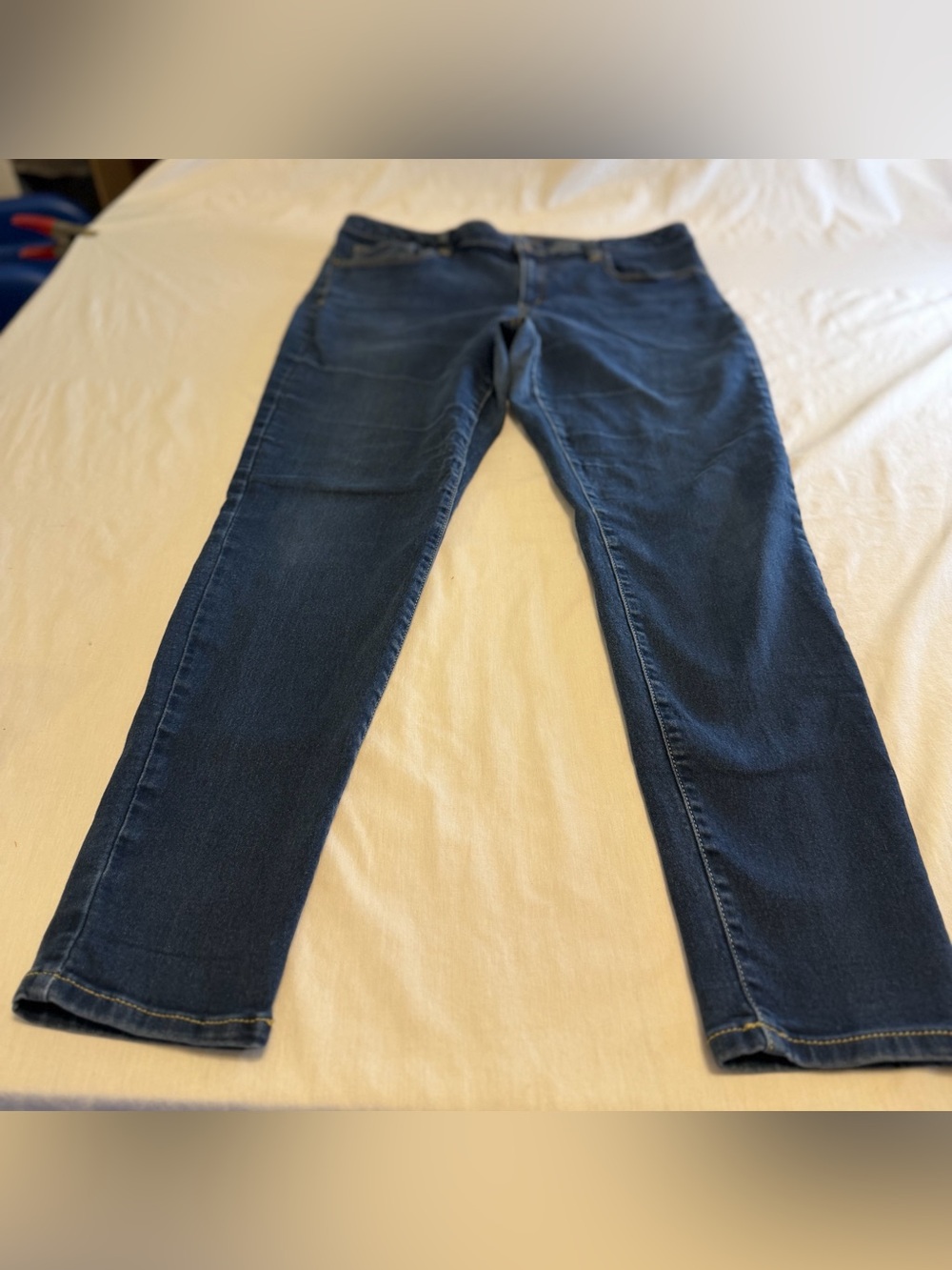 Michael Kors dark indigo denim with yellow stitch detail